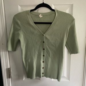 Green ribbed short sleeve v-neck top